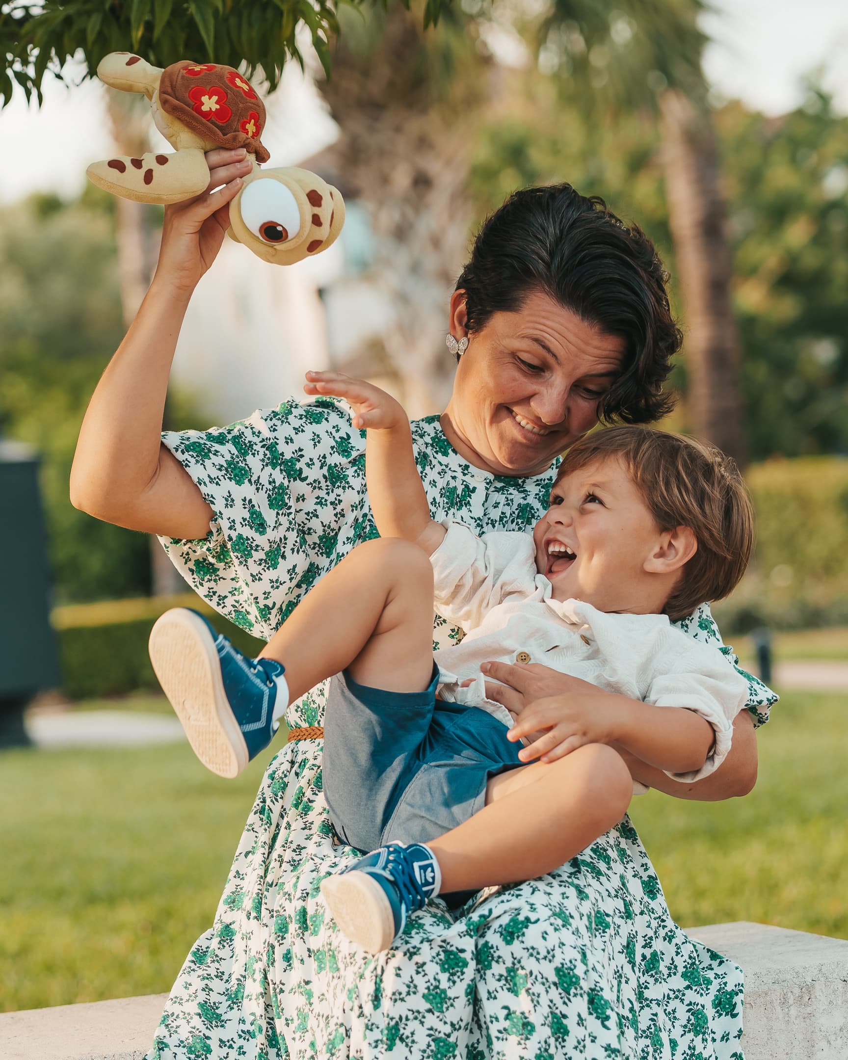 Mother and toddler in park, golden light